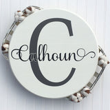 Round wood family name sign
